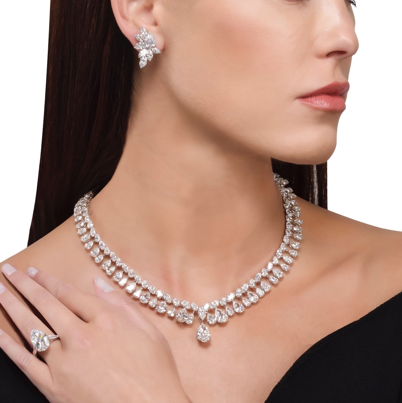 Diamond earrings, necklace and ring set by Jahan Diamond earrings, necklace and ring set by Jahan